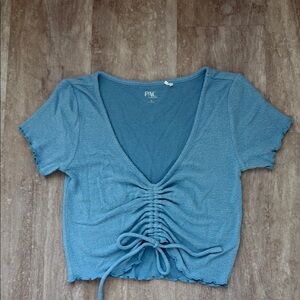 PAC Cares women’s light blue croptop